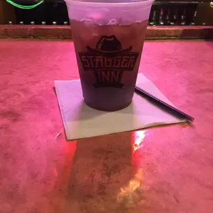 a drink in a plastic cup