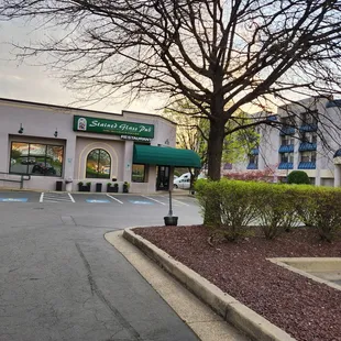 Left is Stained Glass Pub. Right is Best Western Plus Hotel.