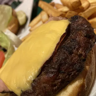 Cheddar cheese, ham and beef patty.