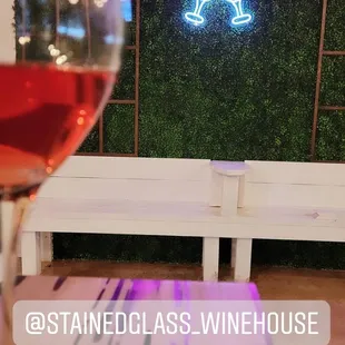 a glass of wine on a table