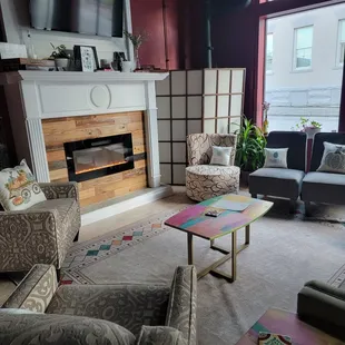 a living room with a fireplace