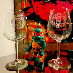 a teenage mutant and a glass of wine