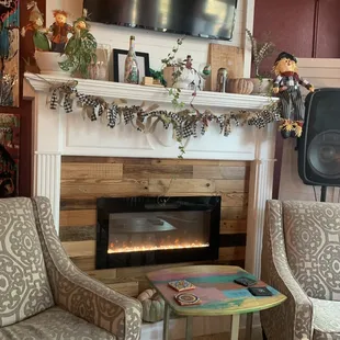 a living room with a fireplace