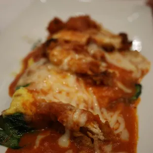 Omelet with grilled cheese, chicken, and spinach