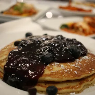 Lemon Ricotta Pancakes Our lightest stak, with creamy Ricotta cheese, infused with juice and zest of fresh lemons, blueberry syrup