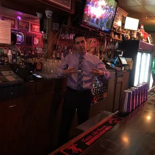 a bartender at the bar