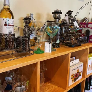 shelves of wine and wine glasses