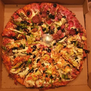 14" half and half speciality pizza (vegetarian and combo)