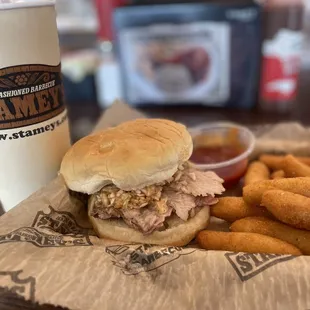 Sliced Pork Barbecue sandwich with Hushpuppies and a Cheerwine.  Also with the Chicken Dip