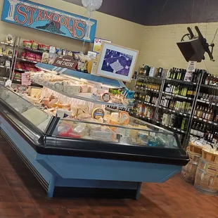 a display of cheeses in a store
