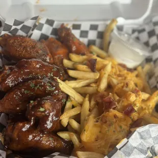Jamaican jerk and hot lemon pepper wings and loaded fries