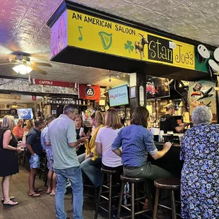 patrons at the bar