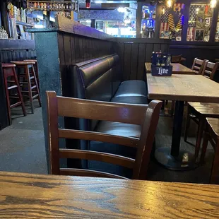 a wooden table and chairs
