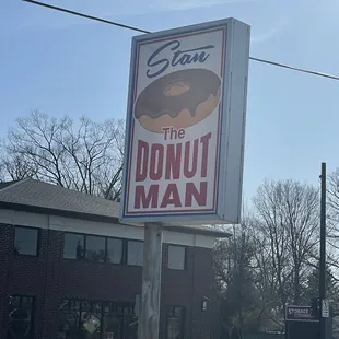 a sign for a donut shop