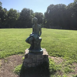 Boy with book statue