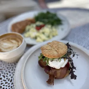 a plate of food and a cup of coffee
