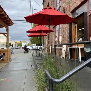 ordering counter on the right, outdoor seating on the left