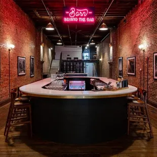 a bar with a neon sign