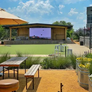 a large screen in the back yard