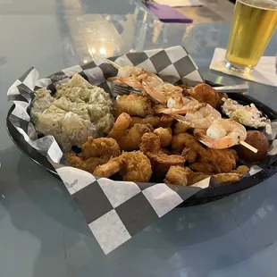 Shrimp Happens platter with extra side, in this case potato salad.