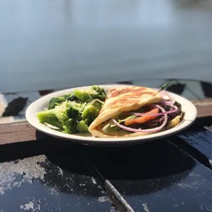 The ribeye flat-which with a side of broccoli.
