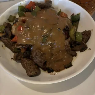 Steak ends with mash potatoes and gravy