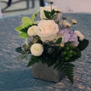 Really nice arrangement with excellent selection of flowers while still maintaining a smaller profile