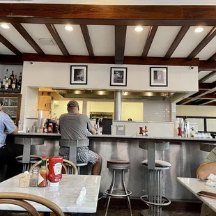 View to bar area and open kitchen