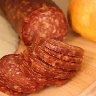 sliced sausage on a cutting board