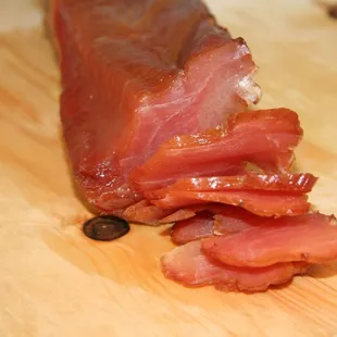 a piece of meat on a cutting board