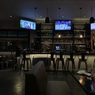 a view of the bar from the dining area