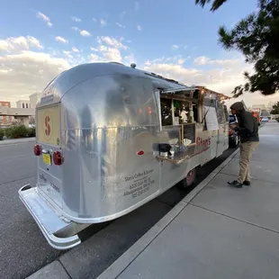 Chatting up a customer on a gorgeous day