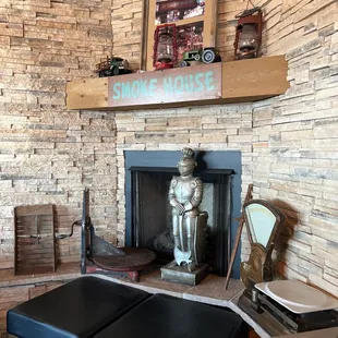 a fireplace with a statue of a knight