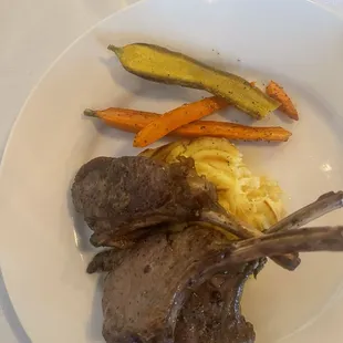 Lamb Chops with grilled vegetables and butter mashed potatoes.