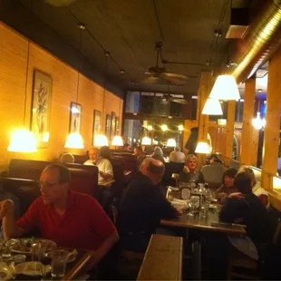 diners sitting at tables in a restaurant