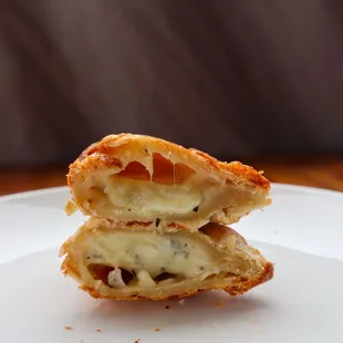 cheesy onion empanada @tiffhuangry