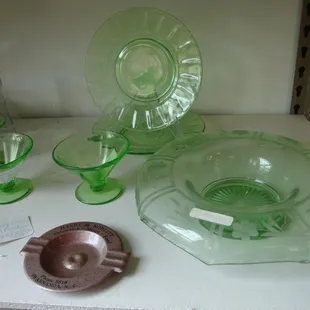 A small group of depression glass (and vintage ashtrays).