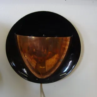 A unique mid-century wall sconce light...a weird one I've never seen before with 2 candelabra bulbs.