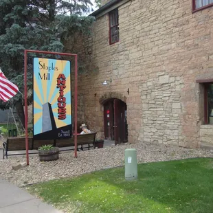 Front entry and main sign, view looking southwest.