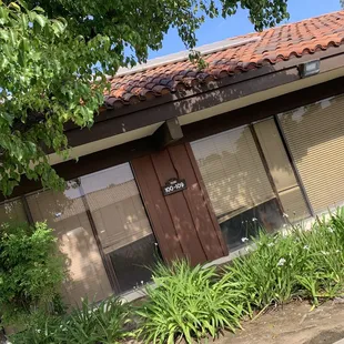 Located in the first building on the right as you enter the gate.