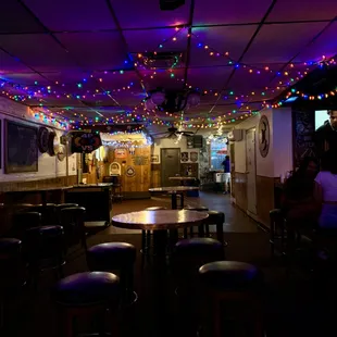 colorful lights in a dimly lit bar