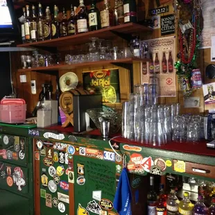 a man behind a bar counter