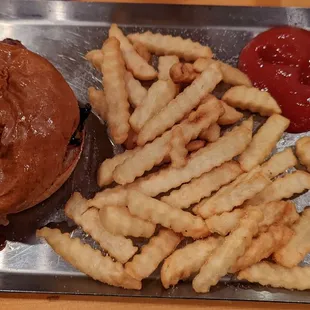 Pulled pork sandwich and side of fries... Definitely not worth $18!!!