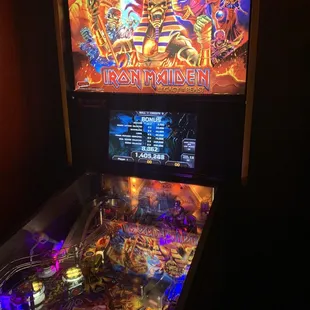a pinball machine in a dark room