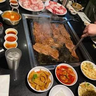 a table full of food and drinks