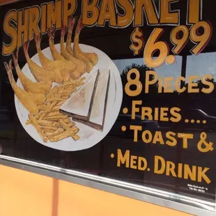 a sign for shrimp basket