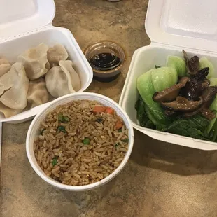 Steamed pork dumplings, $1 fried rice, and bok choy