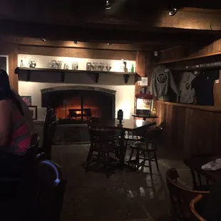 a woman sitting at a bar