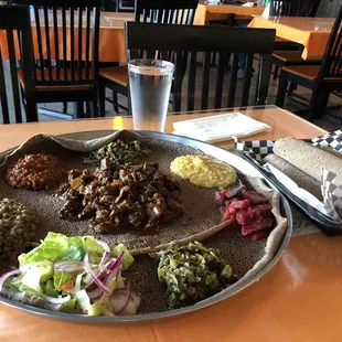 Awaze Tibs (center) and Vegetarian Combo