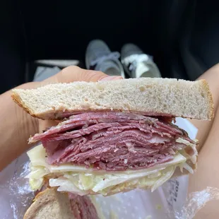 Corned Beef Special (Our #1 Seller)   (Corn Beef on Rye Bread, coleslaw, Swiss cheese and Russian dressing) added Pastrami!